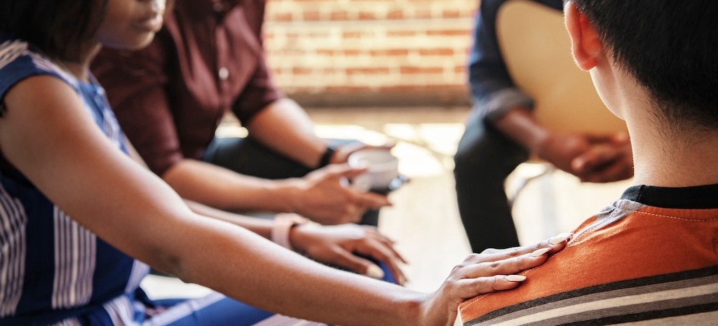 Diverse people in a support group